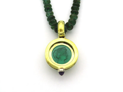 9K gold cameo glass and amethyst enhancer with emerald bead necklace.