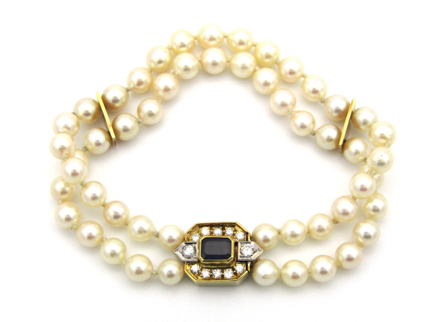 18K gold sapphire and diamond double strand Akoya cultured pearl bracelet, circa 1970's.
