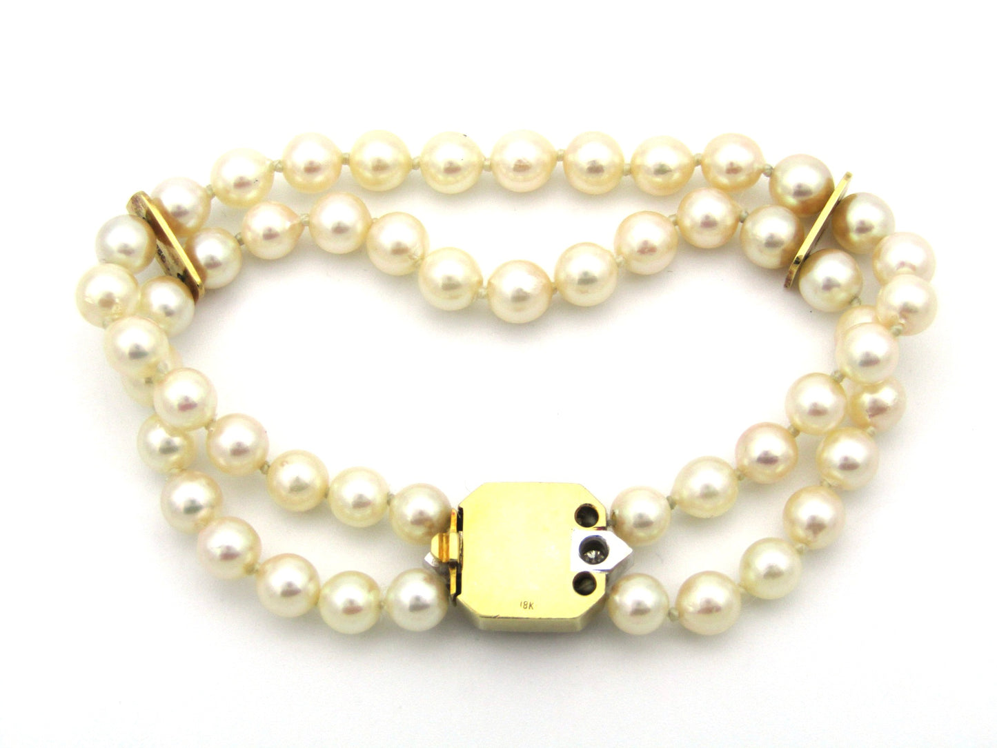 18K gold sapphire and diamond double strand Akoya cultured pearl bracelet, circa 1970's.