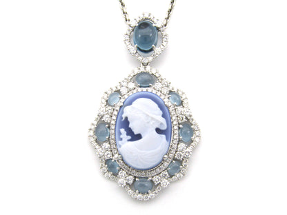 18K gold agate cameo, blue topaz and diamond pendant.