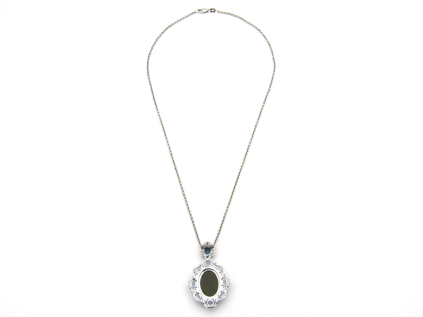 18K gold agate cameo, blue topaz and diamond pendant.