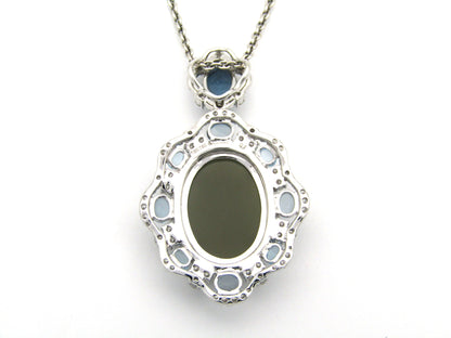 18K gold agate cameo, blue topaz and diamond pendant.