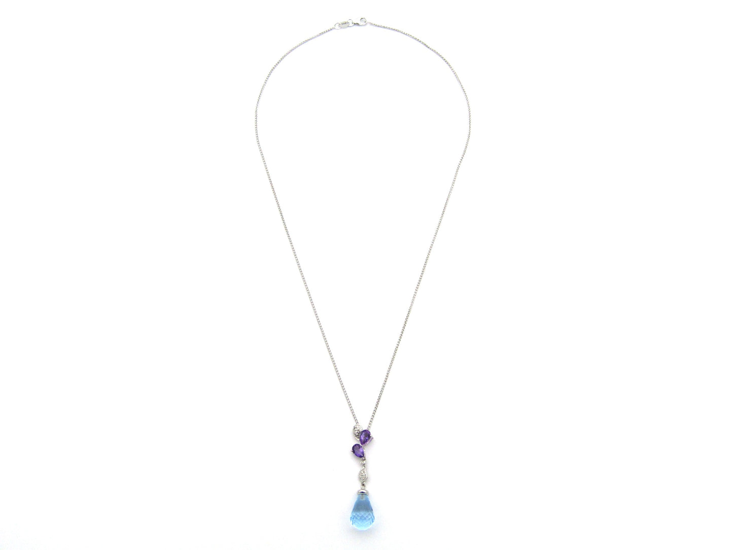 18K gold blue topaz, amethyst, and diamond pendant.
