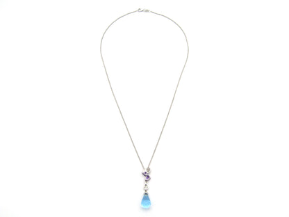 18K gold blue topaz, amethyst, and diamond pendant.