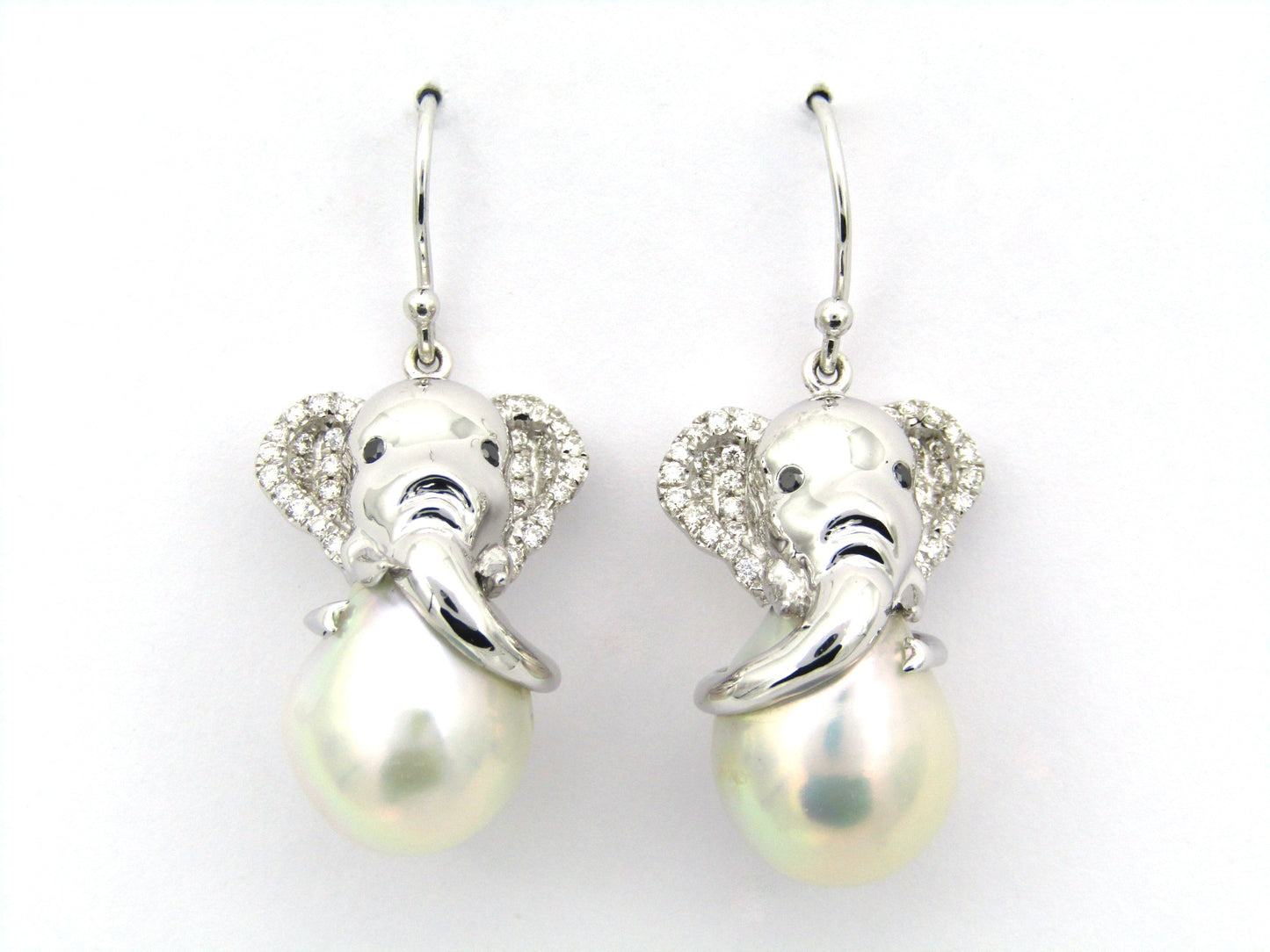 14K gold baroque pearl and diamond elephant earrings.