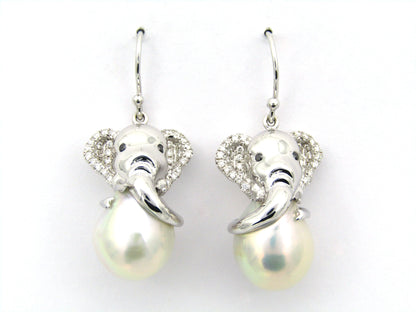 14K gold baroque pearl and diamond elephant earrings.