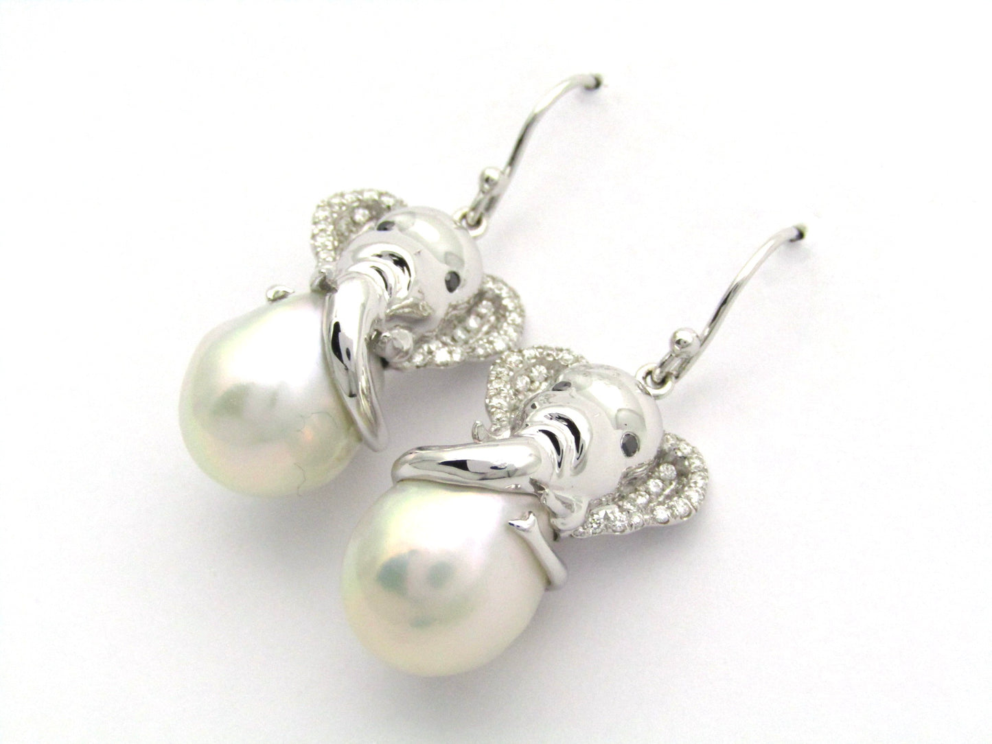 14K gold baroque pearl and diamond elephant earrings.
