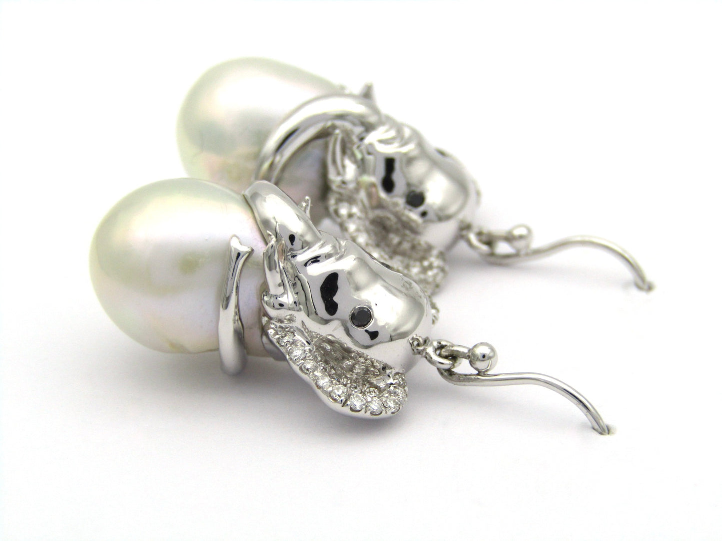 14K gold baroque pearl and diamond elephant earrings.