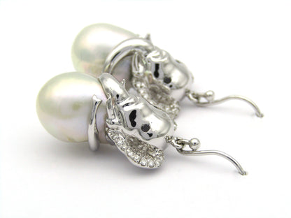14K gold baroque pearl and diamond elephant earrings.