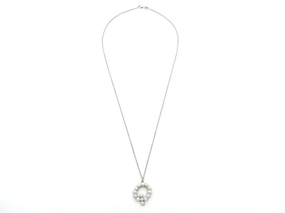 9K gold Akoya cultured pearl 'Q' pendant.