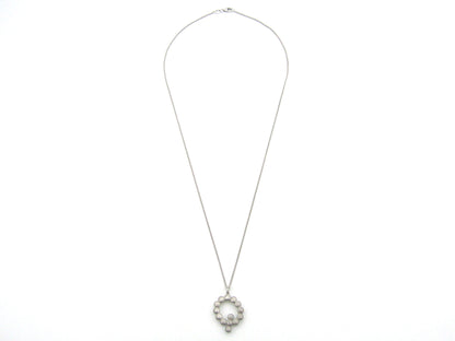 9K gold Akoya cultured pearl 'Q' pendant.