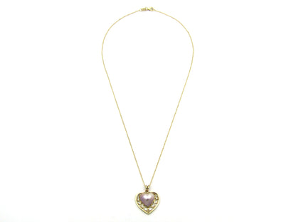 9K gold pink mabe pearl filigree heart pendant.