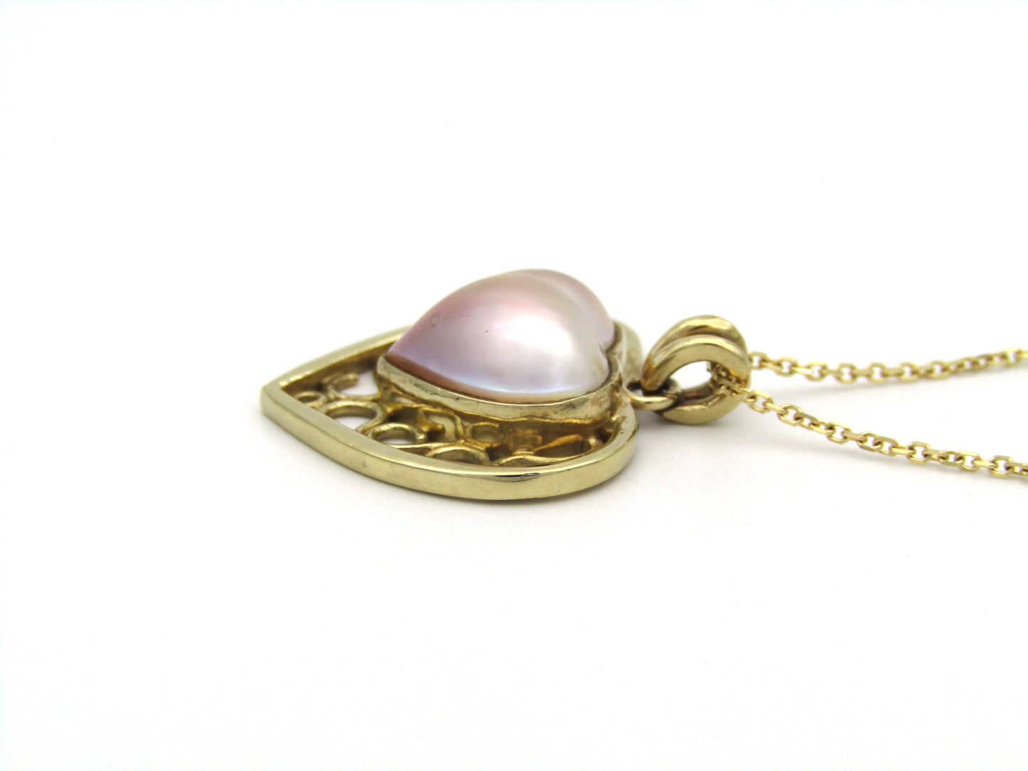 9K gold pink mabe pearl filigree heart pendant.