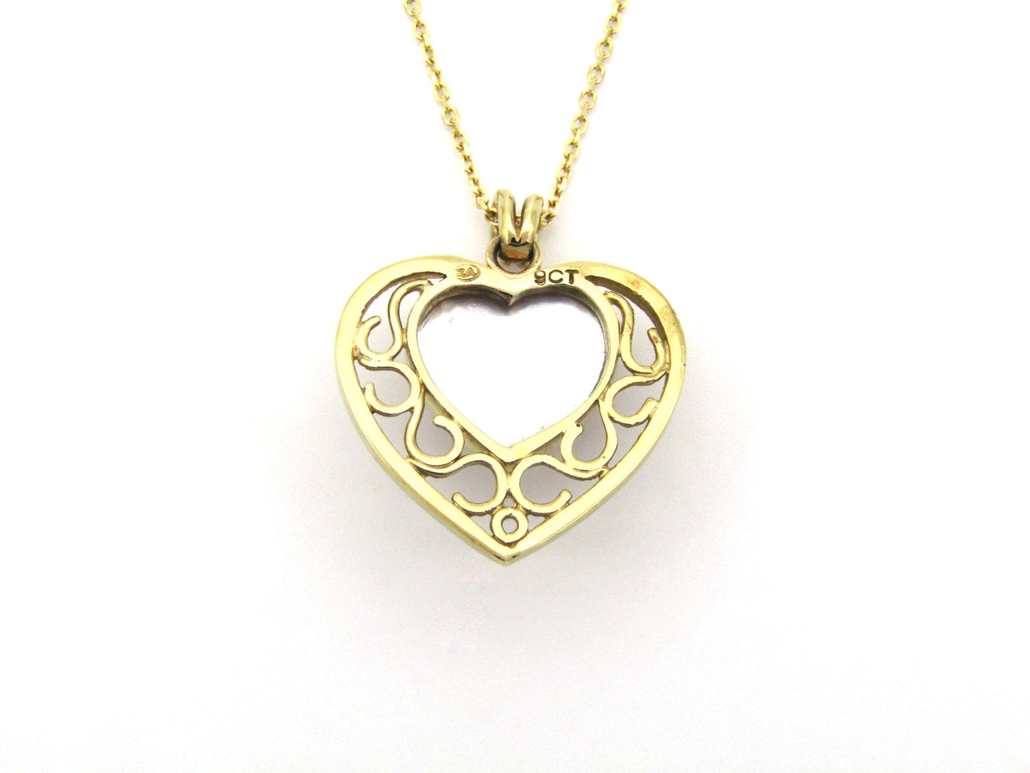 9K gold pink mabe pearl filigree heart pendant.