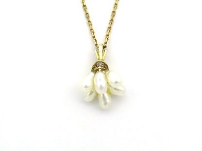 9K gold pearl 'tassel' and diamond pendant.