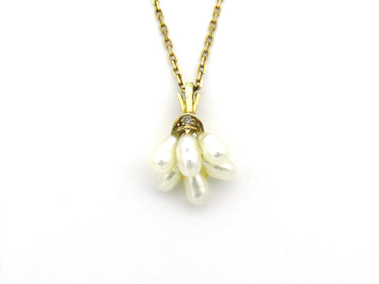 9K gold pearl 'tassel' and diamond pendant.