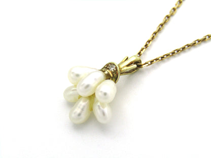 9K gold pearl 'tassel' and diamond pendant.