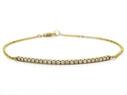 18K gold diamond bar bracelet.