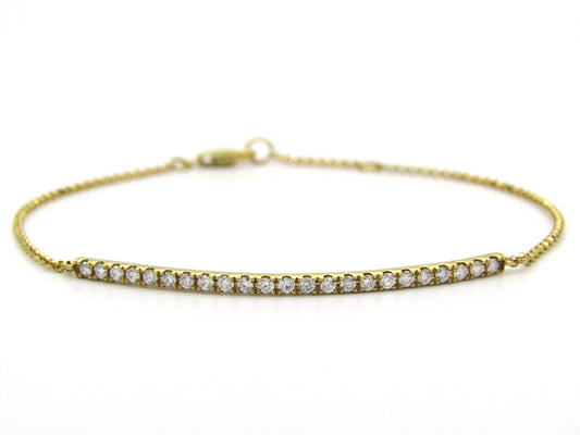 18K gold diamond bar bracelet.