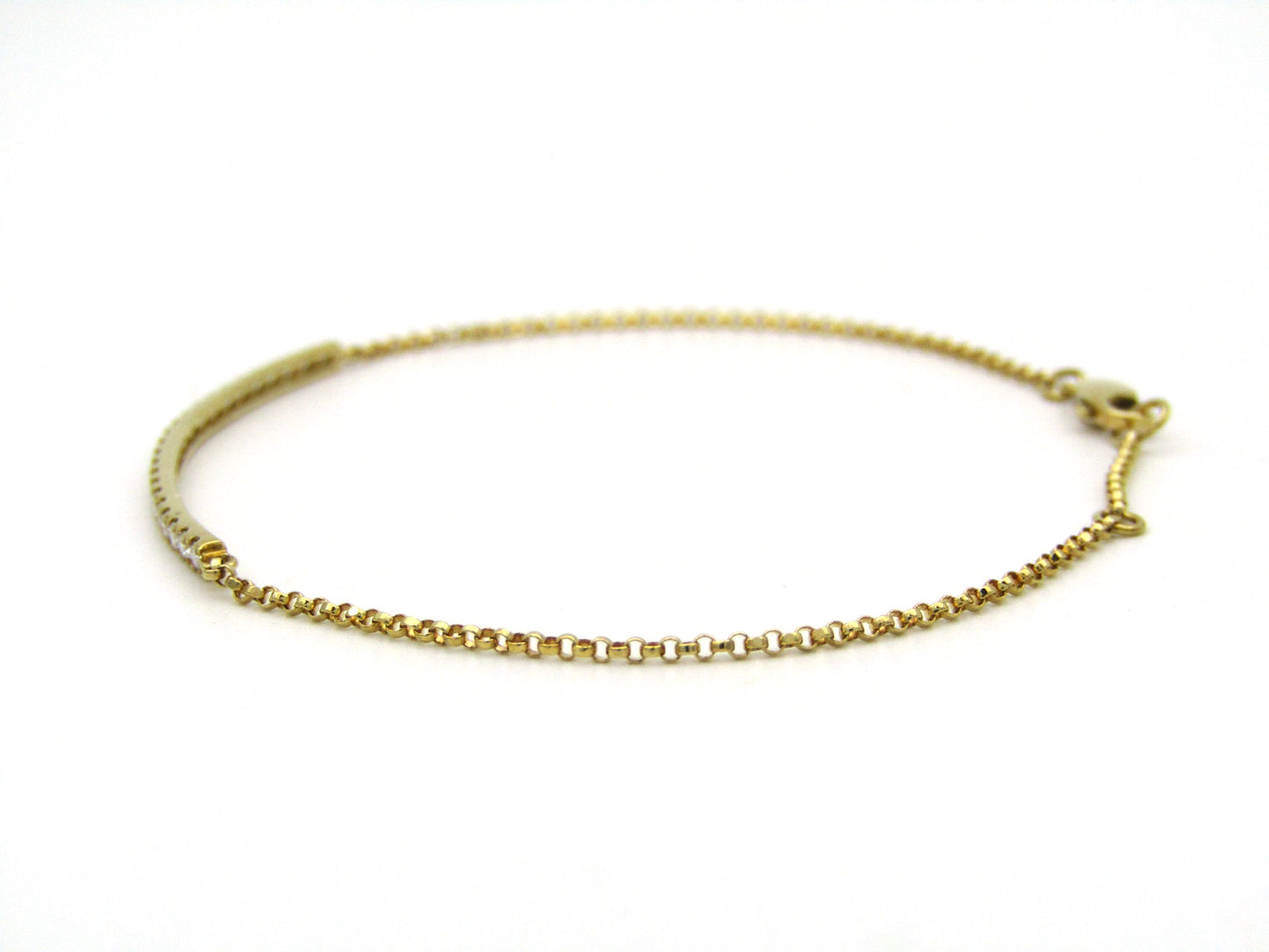18K gold diamond bar bracelet.