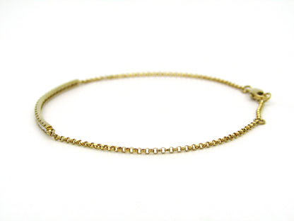 18K gold diamond bar bracelet.