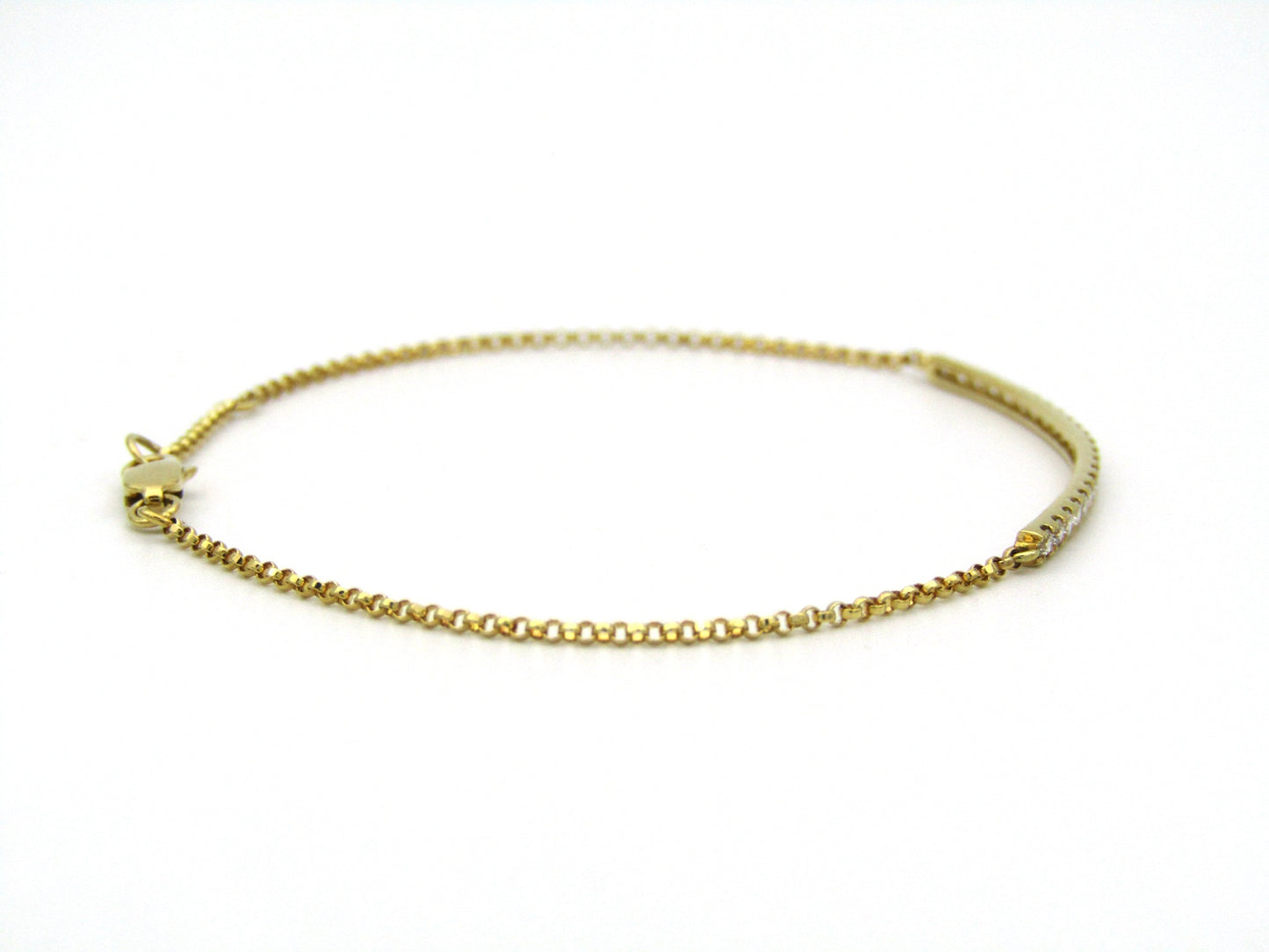 18K gold diamond bar bracelet.