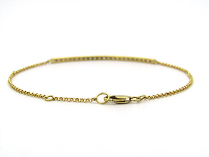 18K gold diamond bar bracelet.