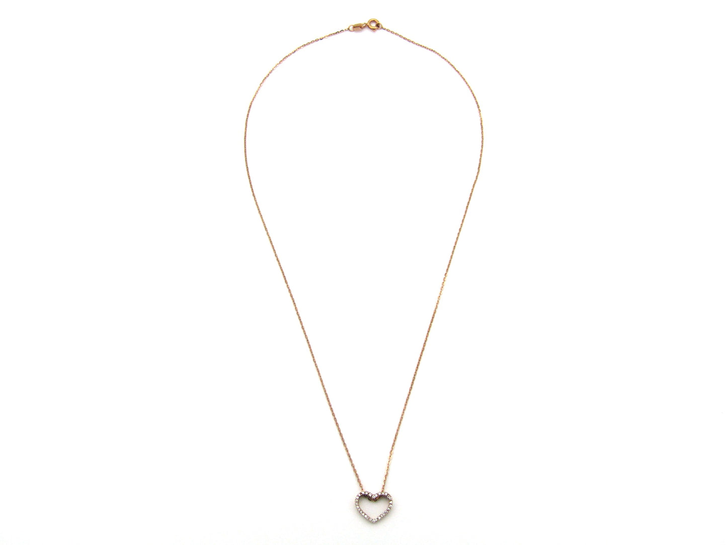 9K gold diamond heart pendant.