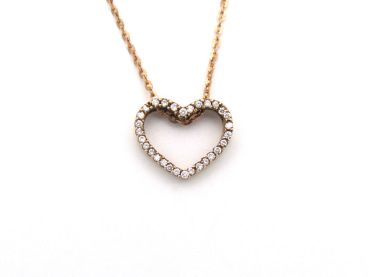 9K gold diamond heart pendant.