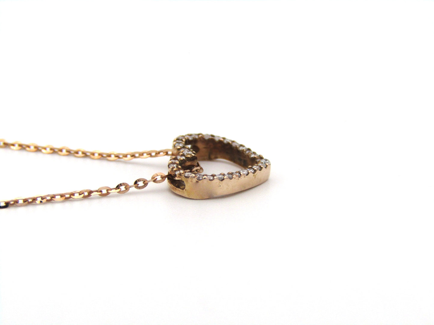 9K gold diamond heart pendant.