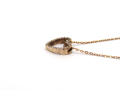 9K gold diamond heart pendant.