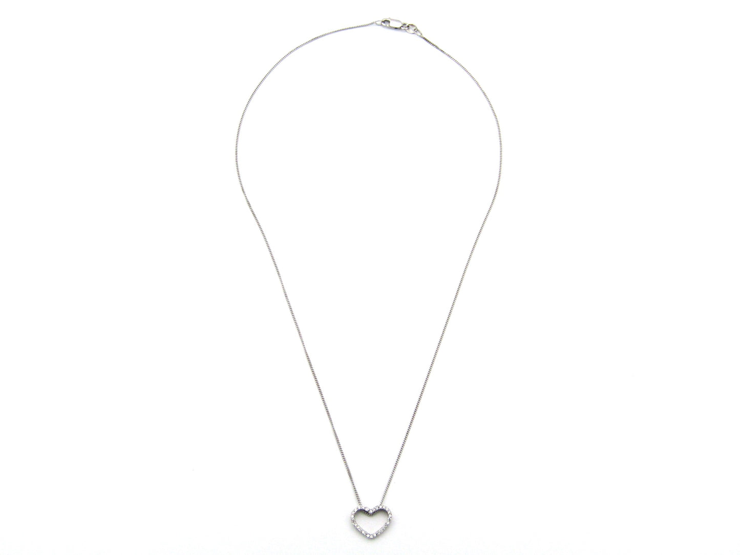 9K gold diamond heart pendant.