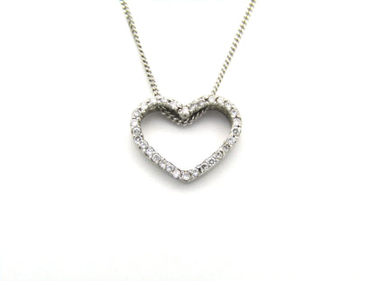9K gold diamond heart pendant.