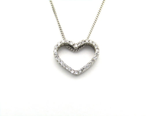 9K gold diamond heart pendant.