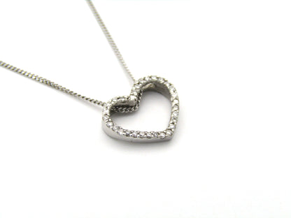 9K gold diamond heart pendant.