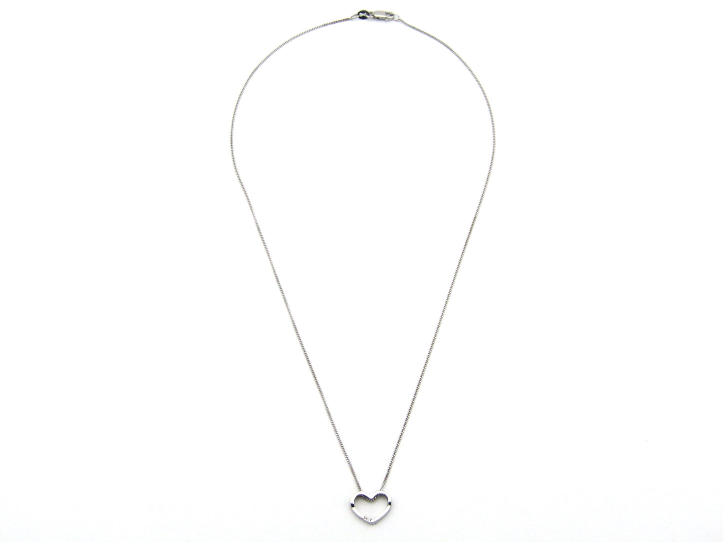 9K gold diamond heart pendant.