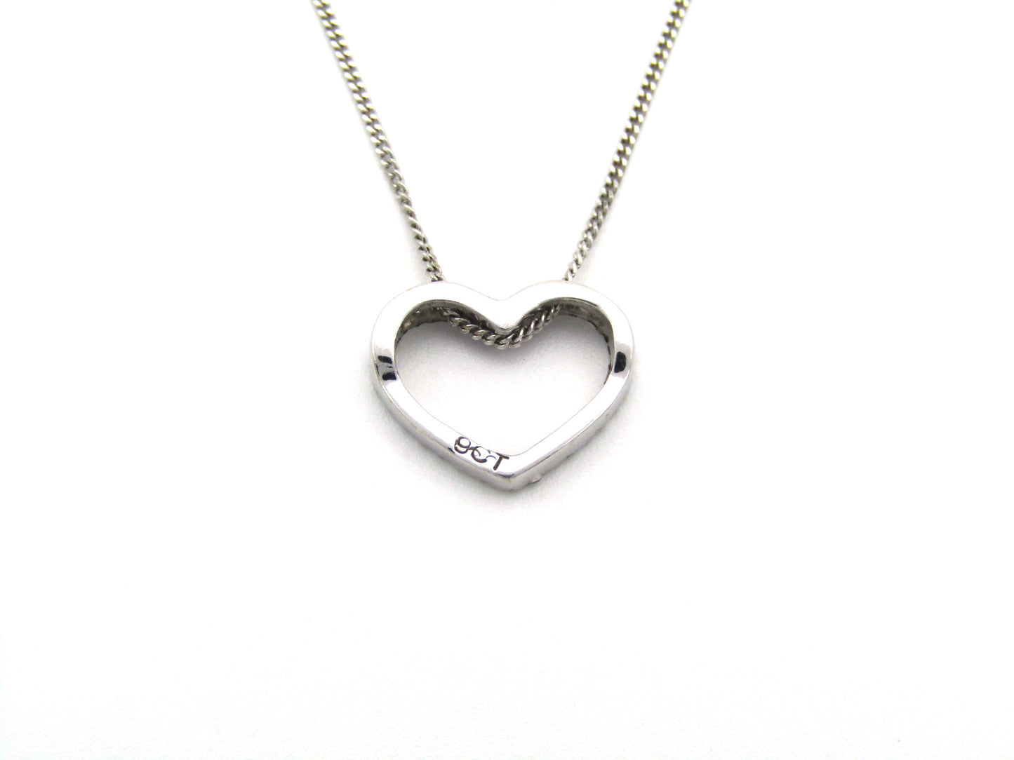 9K gold diamond heart pendant.