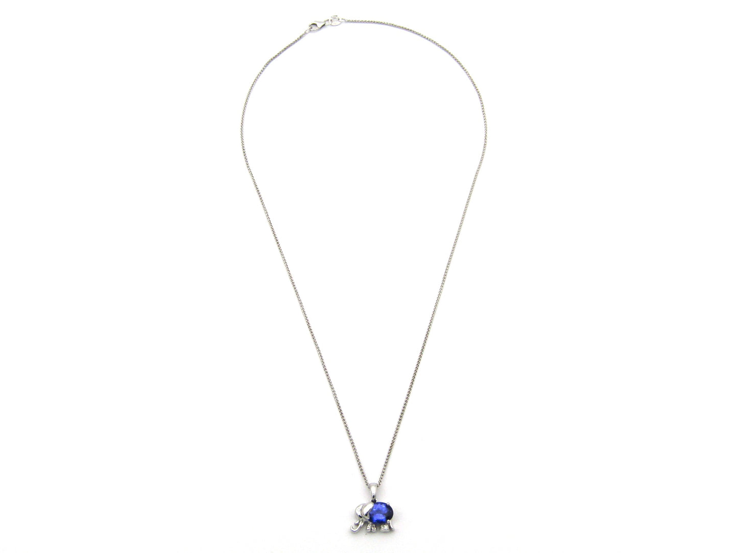18K gold tanzanite and diamond elephant pendant.