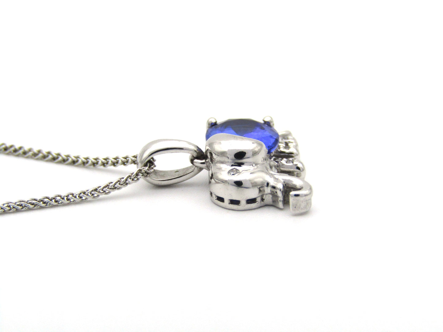 18K gold tanzanite and diamond elephant pendant.
