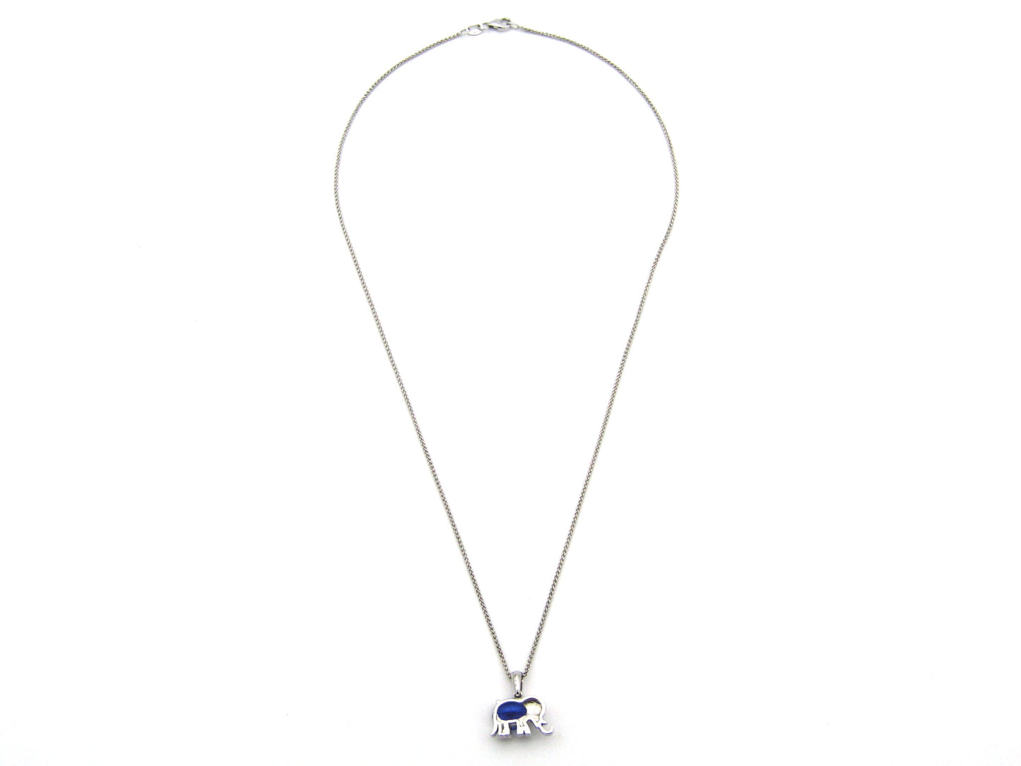 18K gold tanzanite and diamond elephant pendant.