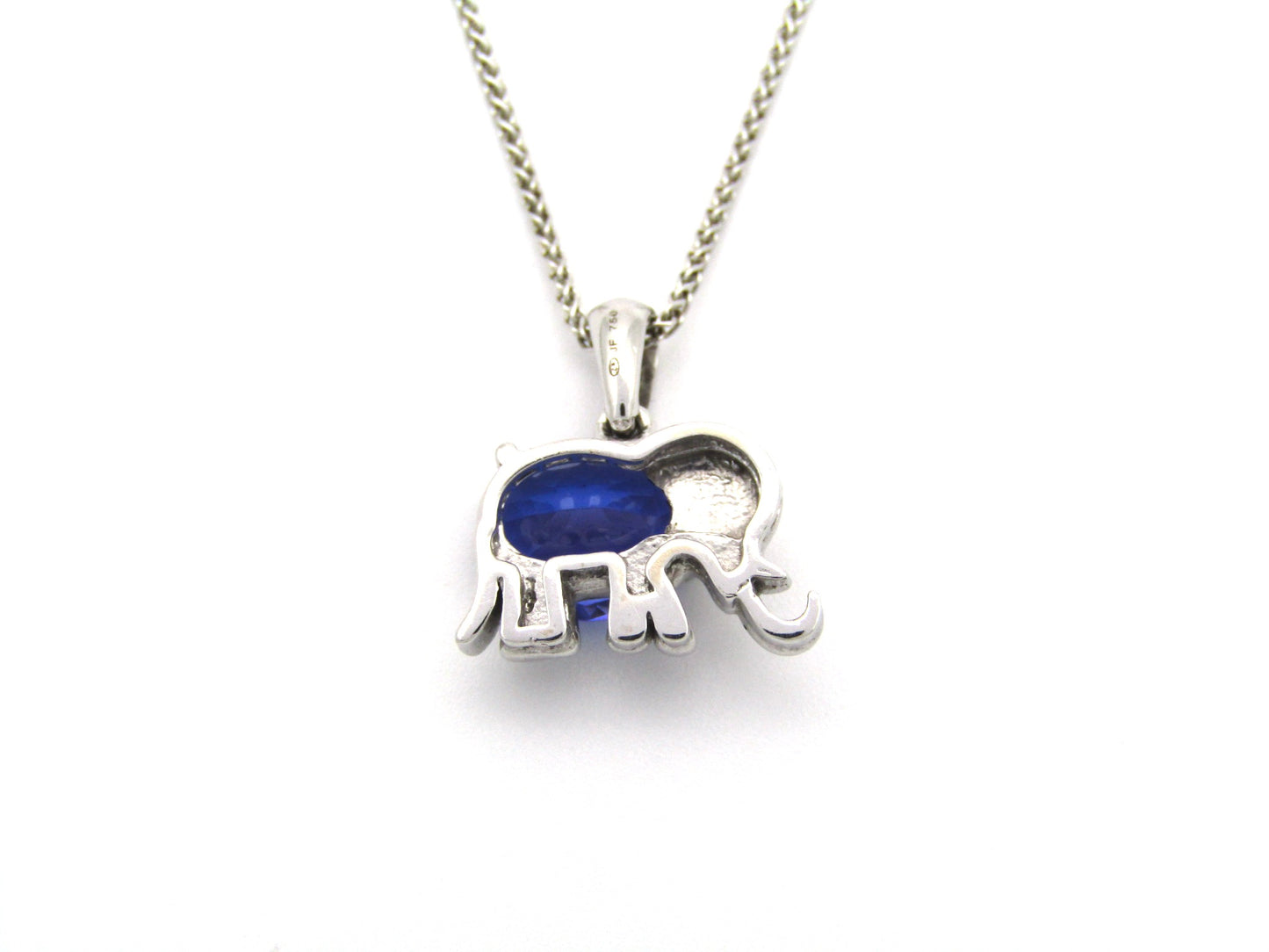 18K gold tanzanite and diamond elephant pendant.