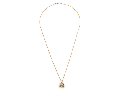 18K gold morganite and diamond elephant pendant.