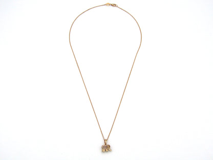 18K gold morganite and diamond elephant pendant.