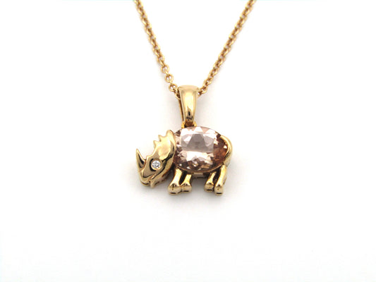 18K gold morganite and diamond rhino pendant.