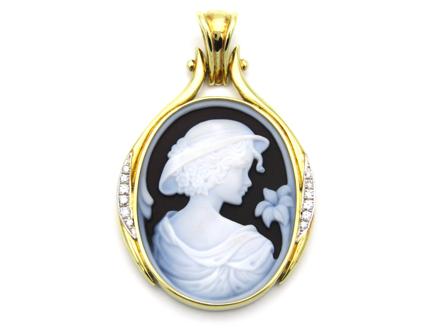 18K gold hard stone cameo and diamond pendant.