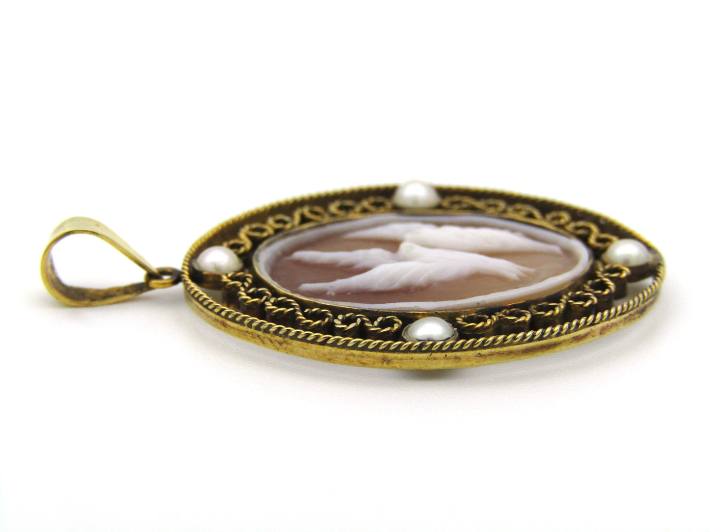 9K gold conch shell cameo and cultured akoya pearl pendant.