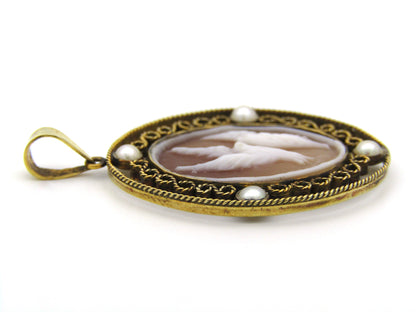 9K gold conch shell cameo and cultured akoya pearl pendant.