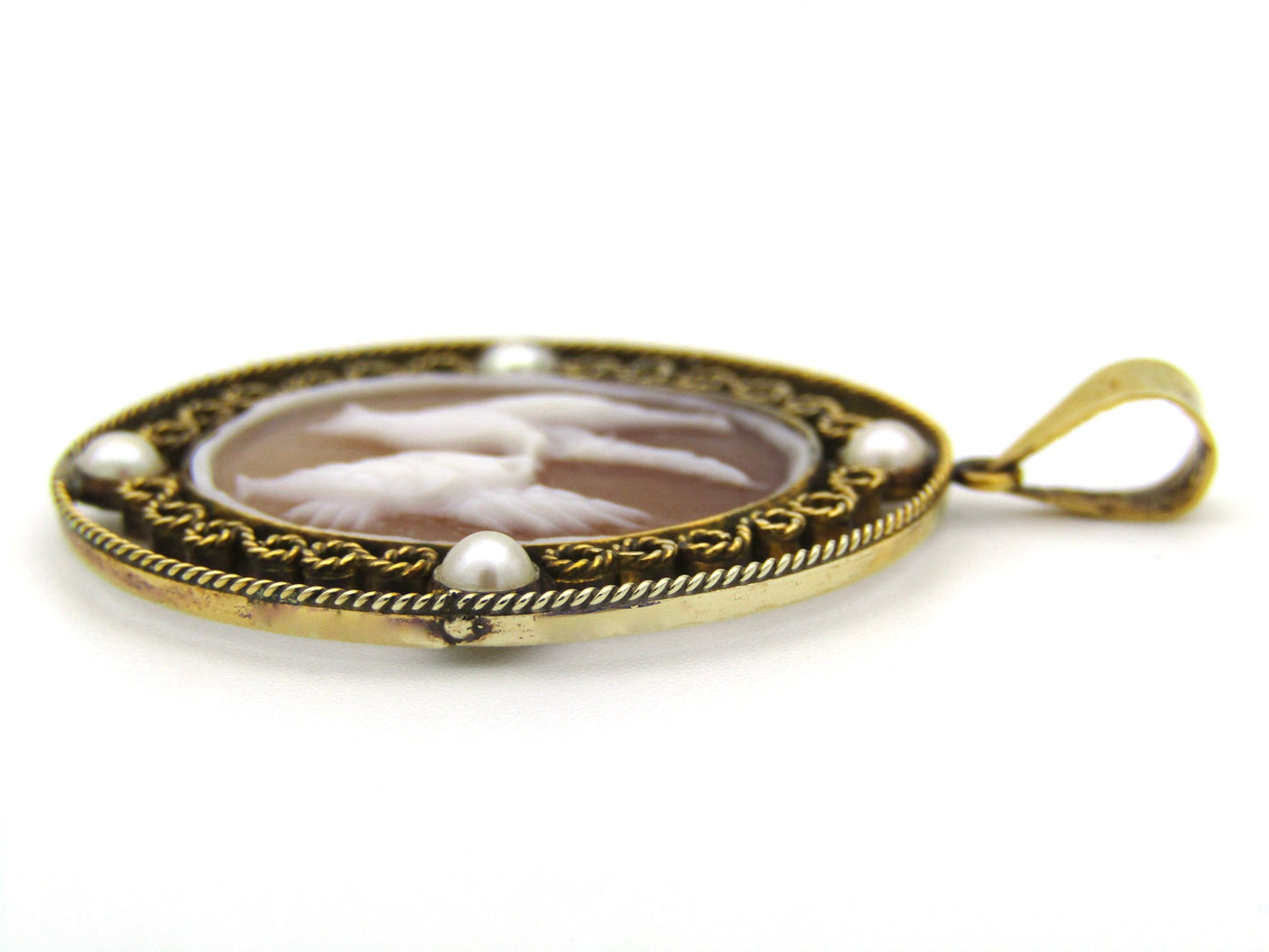 9K gold conch shell cameo and cultured akoya pearl pendant.