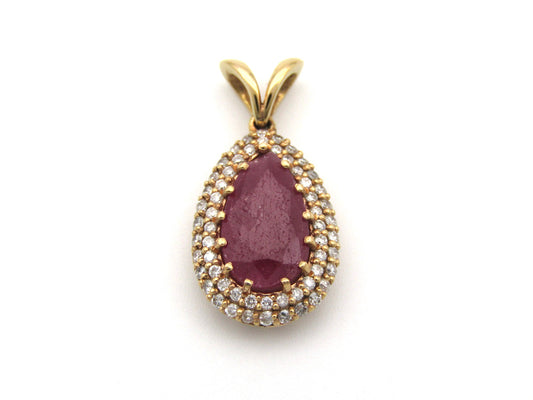 18K gold ruby and diamond pendant.