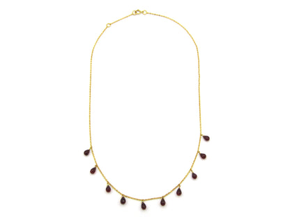 18K gold garnet necklace.